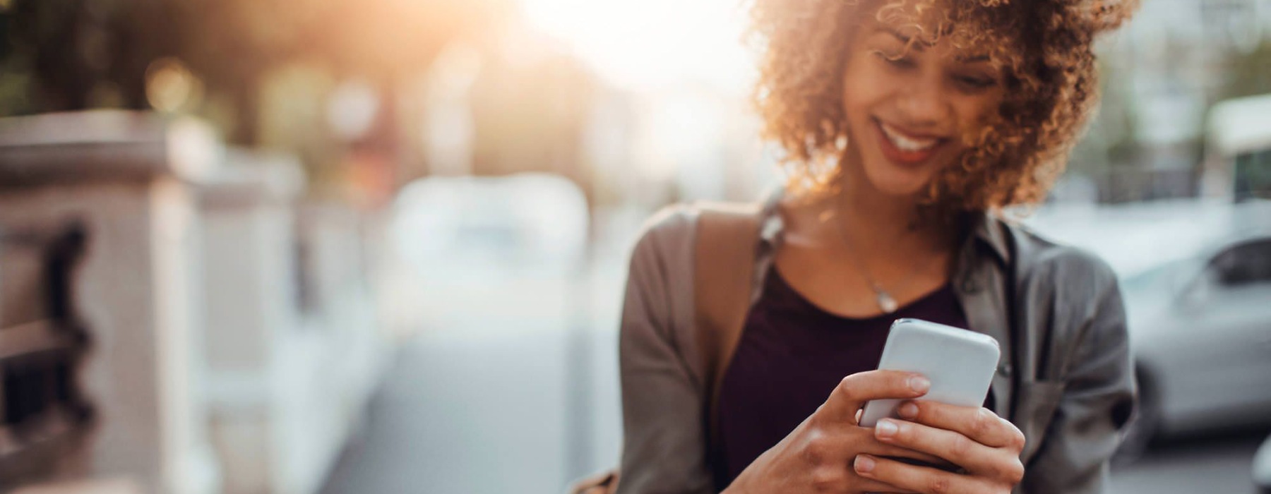 a woman holding a phone