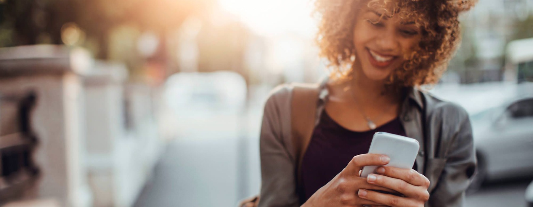 a woman holding a phone
